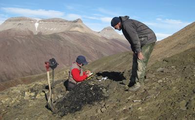 Professor John Marshall, left, taking samples in Spitsbergen for research into extinction event. Credit: Sarah Wallace Johnson